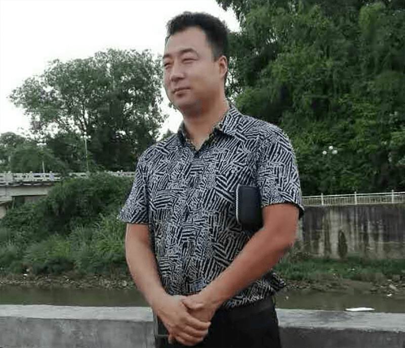 Wujiang Feng (General Manager)
