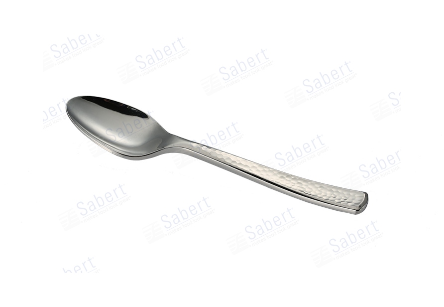 Silver hammered spoon